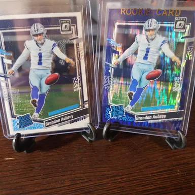 Brandon Aubrey 2 Card Rookie Lot..2023 Optic Rated Rookie Base And Purple Shock...Cowboys