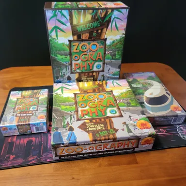 Zoo-ography : A Tile Laying Zoo Builder Game Plus Monorail Expansion and Card Game