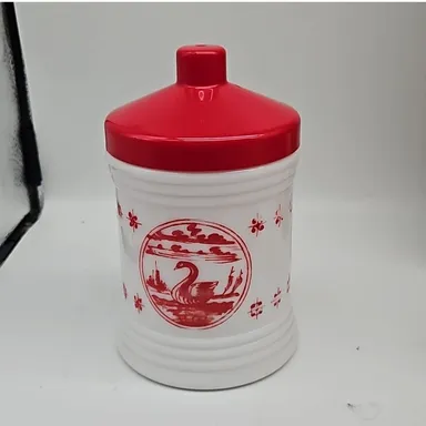 red and white milk glass canister