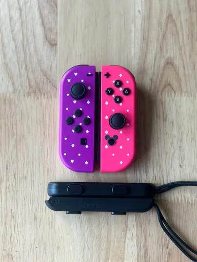 Nintendo Switch Joy Cons Disney Pink Purple
