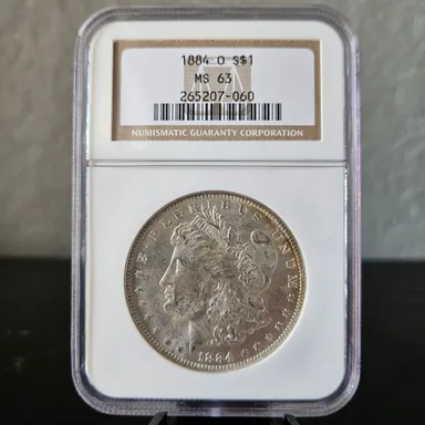 $ 1884-O MORGAN DOLLAR MS63 NGC $1 COIN