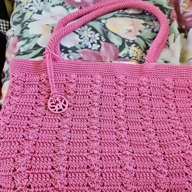 the sak pink crocheted bag