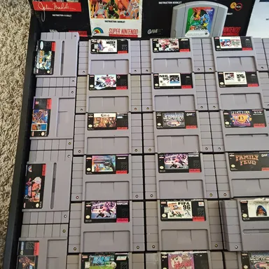 35 SNES games, one Japanese pokemon stadium N64 and 6 Manuel's .