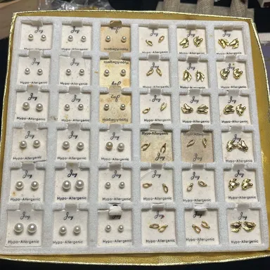 Vintage display filled with 36 pair of stud earrings. Gold tone and mixed styles TTS104*
