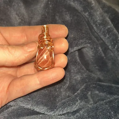Copper wire wrap rhodochrosite pendant