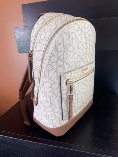 $188 Calvin Klein two layers backpack STYLE H1AKJPA2 logo covered vanilla brown side pocket soft str