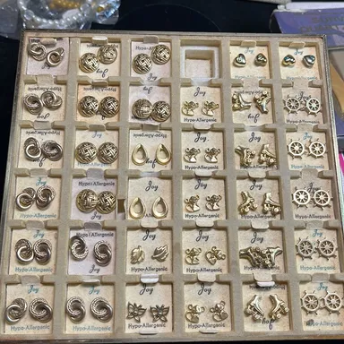 Vintage display filled with 35 pairs of stud earrings. Gold tone and mixed styles TTS106*