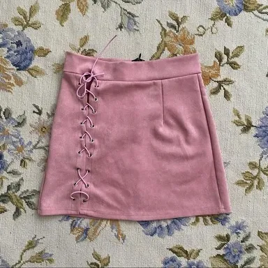 Pink faux suede lace up mini skirt