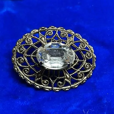 VINTAGE  small Brooch ornate large clear center stone  pin brooch.  C clasp