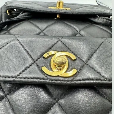 Authentic Chanel Vintage Black Duma Leather Quilted Mini backpack with 24k