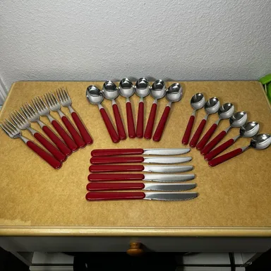 24 PIECE REED AND BARTON STAINLESS FLATWARE NOUVELLE RED DINNER REBACRAFT