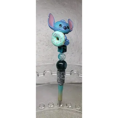 Disney Figure Beaded Pen Stitch from Lilo and Stitch Holding a Donut