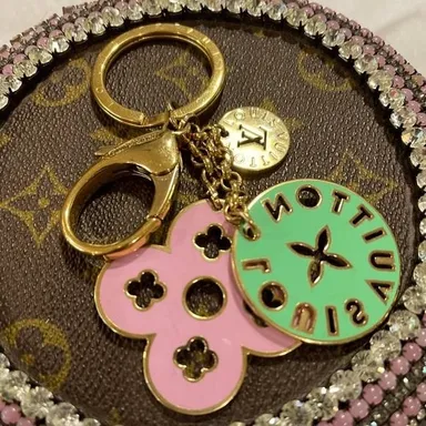Louis Vuitton authentic bag charm or key ring. Different colors on each side.