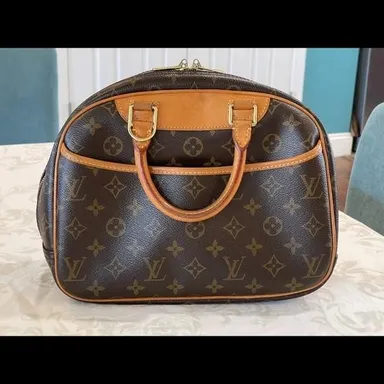 Louis Vuitton authentic monogram Trouville bag.