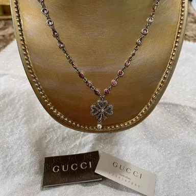 Gucci authentic Crystal and faux pearl bow pendant necklace. Sterling silver.
