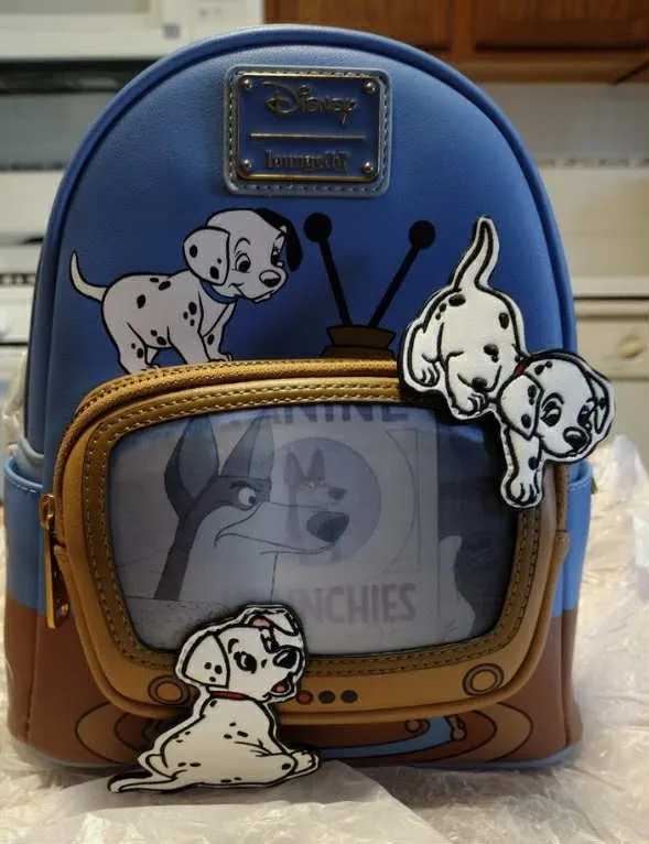 coach disney dalmatian backpack the Pup Camera Bag youll find a debossed pattern of puppy prints Disney Coach 101 Dalmatians Bag