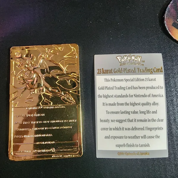 1999 pokemon charizard 23kt gold plated trading card Pokemon-Charizard-23K Gold Plated Trading Card 1999 – CertiMart Inc main image 0