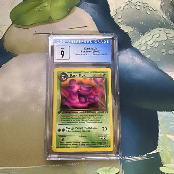 first edition muk pokemon card Rare Holo Shiny card. Fossil 13/62 This power stops working while Dark Muk is Asleep Pokemon Team Rocket Uncommon Dark